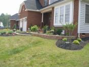 Beautiful landscaping of retaining wall